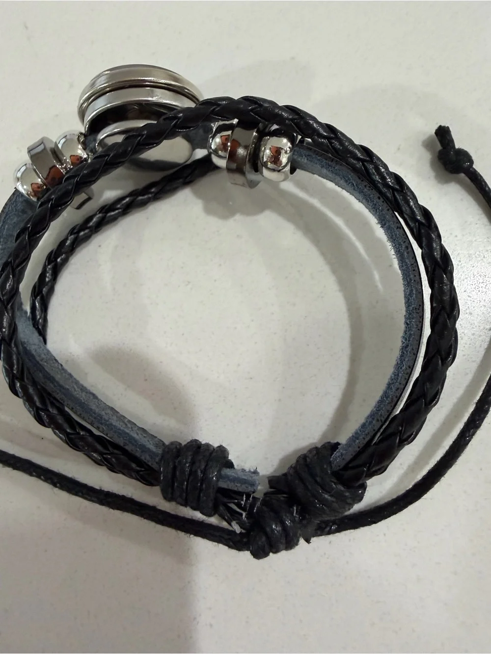 Spirilet Zodiac Black Braided Leather Bracelet with Blue Iridescent Cabochon